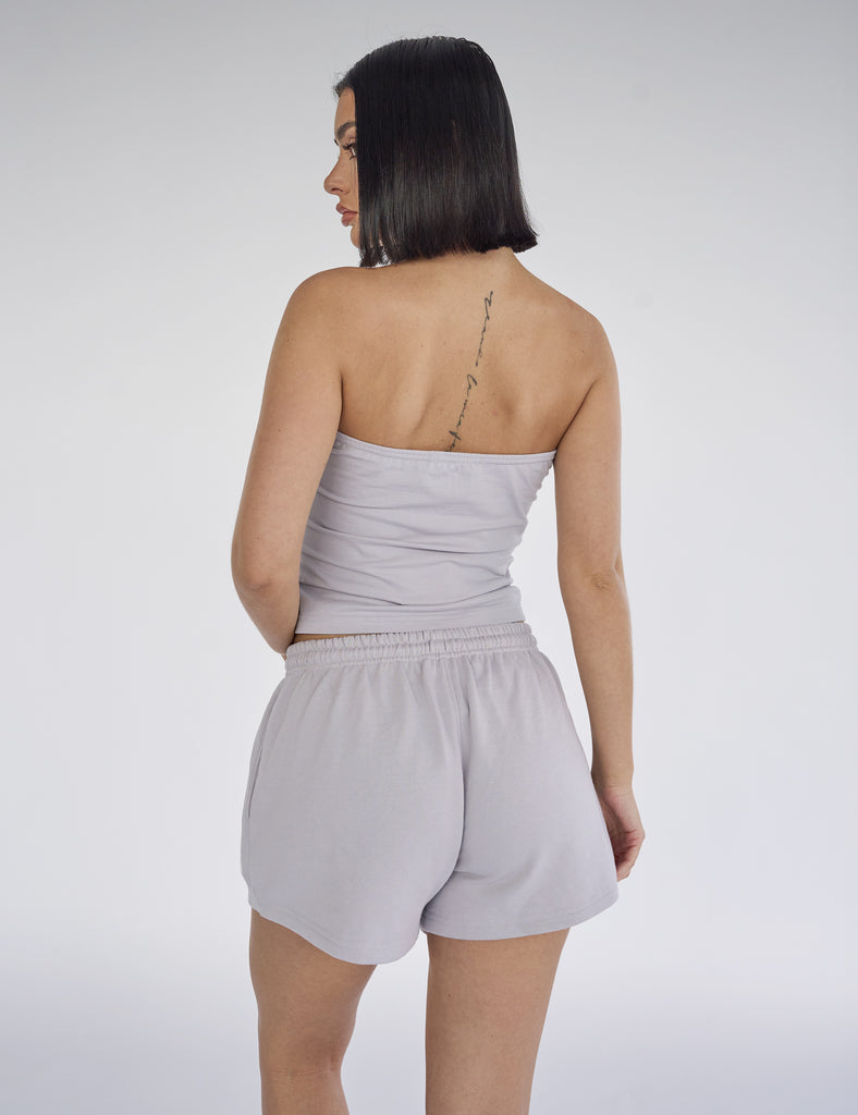 Tiria Cutout Bandeau Top in Bubble Gum met Leaf Green Binding main image 0